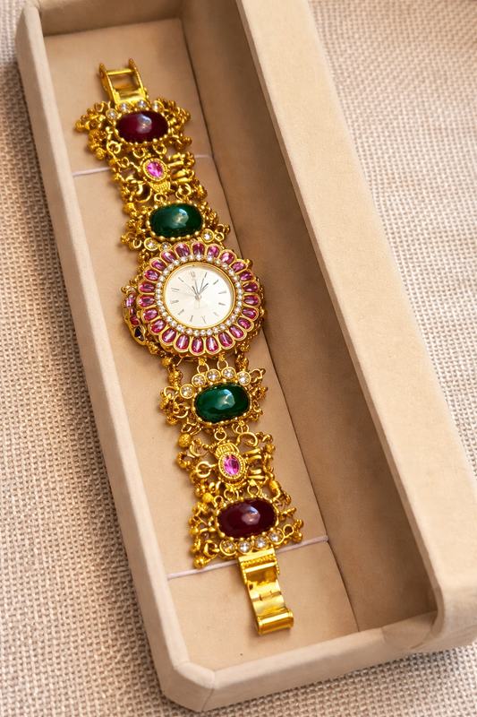 Elegant golden wristwatch with initials